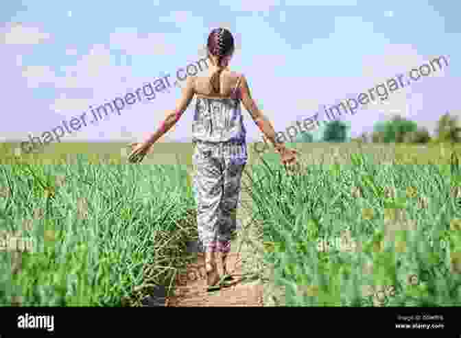 A Young African Girl Walking Through A Field, Surrounded By Towering Trees And Lush Vegetation Akuti Nancy Blakey