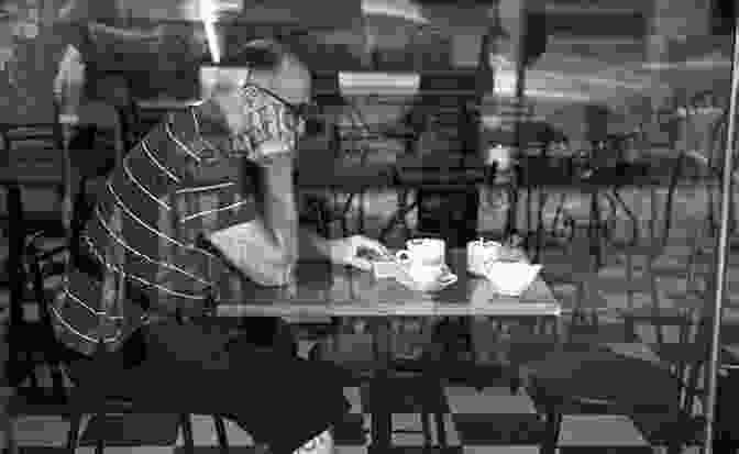 Image Of A Man Sitting Alone At A Table In A Crowded Cafe, Lost In Thought. Flicker (The Simply Senryu 1)