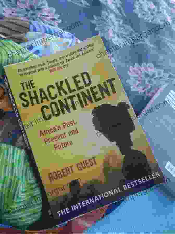 The Shackled Continent Book Cover Featuring An Image Of A Man In Chains Against The Backdrop Of An African Landscape The Shackled Continent: Power Corruption And African Lives